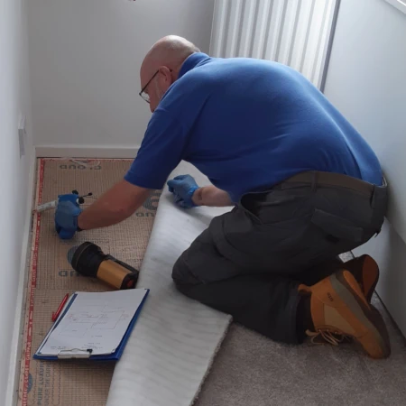 Russell applying insect bait